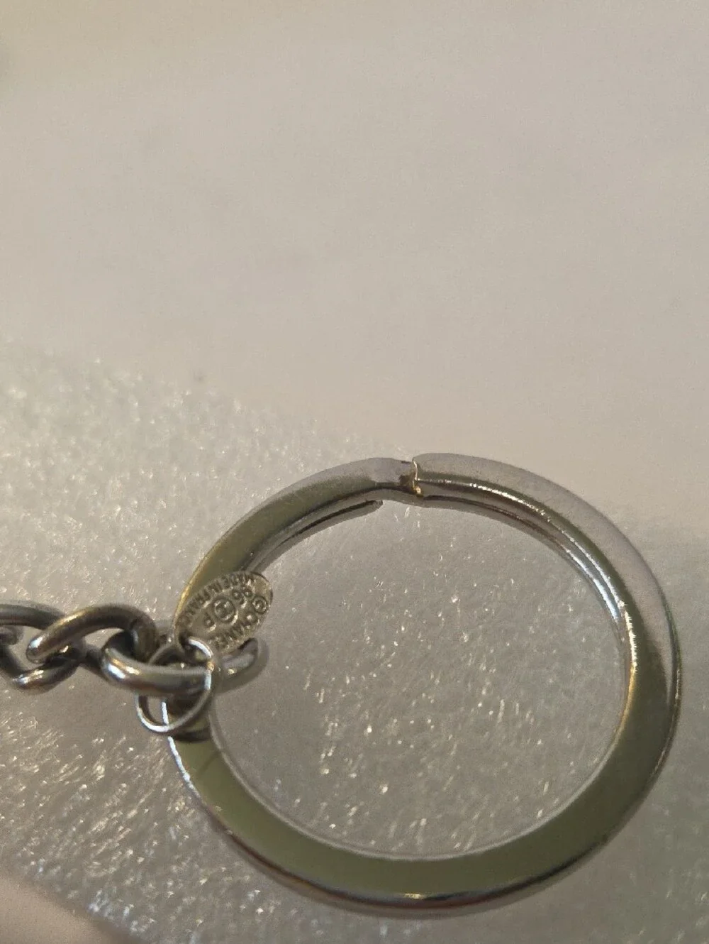 CHANEL Silver-Tone Metal Book Charm Keyring Vintage
